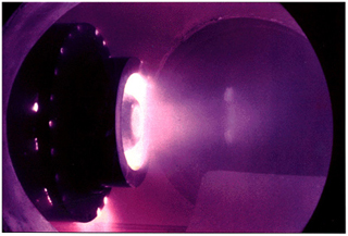 A Magneto Plasma Dynamic thruster test firing. A Magneto Plasma Dynamic thruster test firing.