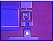 Superconducting Josephson qubit surrounded by a SQUID readout circuit.