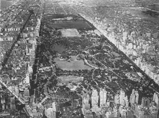 A black and white aerial photograph of Central Park in New York City.