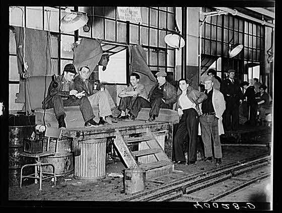 Strikers guarding window entrance to Fisher body plant number three. Flint, Michigan.